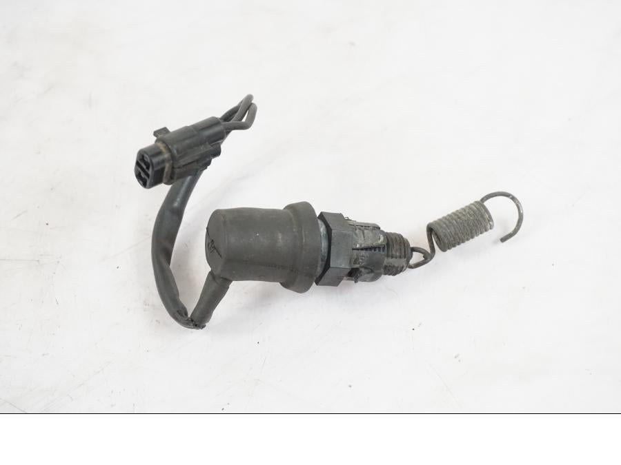 Framsidan på Bromsljuskontakt från en Yamaha XVS 1100 -2004 motorcykel.