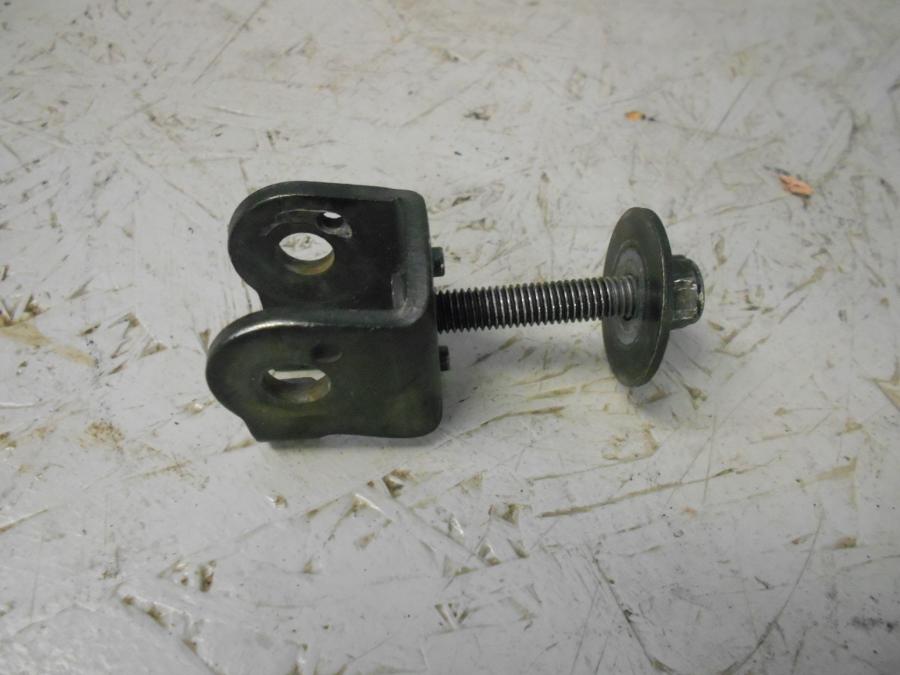 Framsidan på Fotpinnefäste från en Triumph Bonneville -2001 motorcykel.