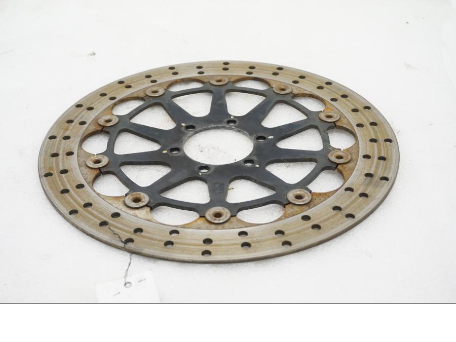 Framsidan på Bromsskiva från en Ducati Monster 696 -2010 motorcykel.