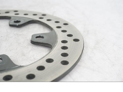 Vänster sida på Bromsskiva från en Suzuki SV 1000 -2004 motorcykel.