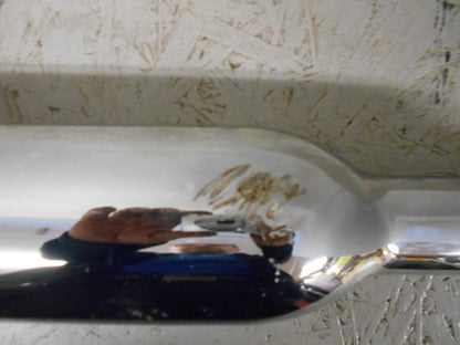 Baksidan på Ljuddämpare från en Triumph Bonneville -2001 motorcykel.