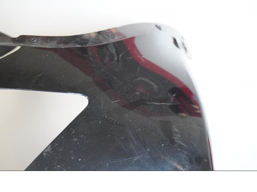 Vänster sida på Toppkåpa från en Kawasaki ZX-9R -1997 motorcykel.