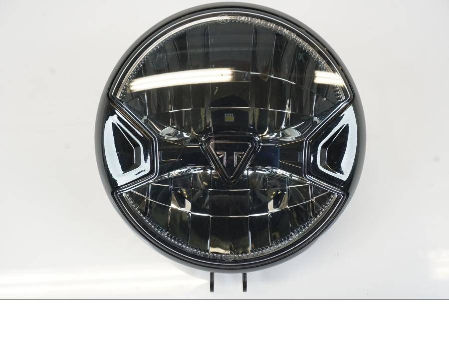 Baksidan på Strålkastare från en Triumph Trident -2021 motorcykel.