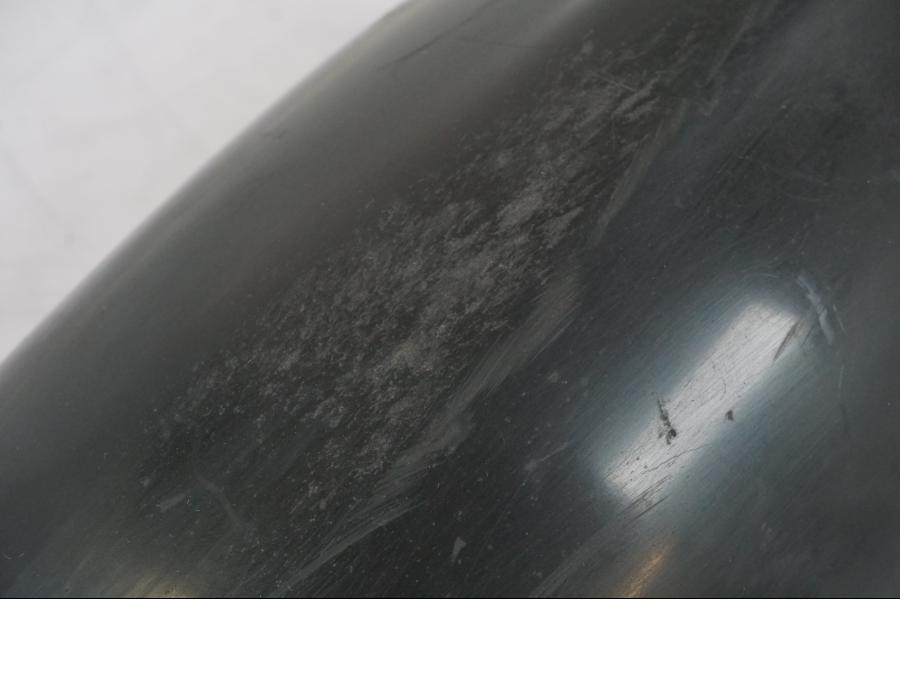 Baksidan på Svingskärm från en Aprilia RS 125 -2000 motorcykel.