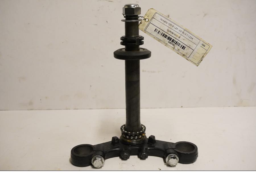 Framsidan på Gaffelkrona från en Yamaha YZF-R 125 -2010 motorcykel.