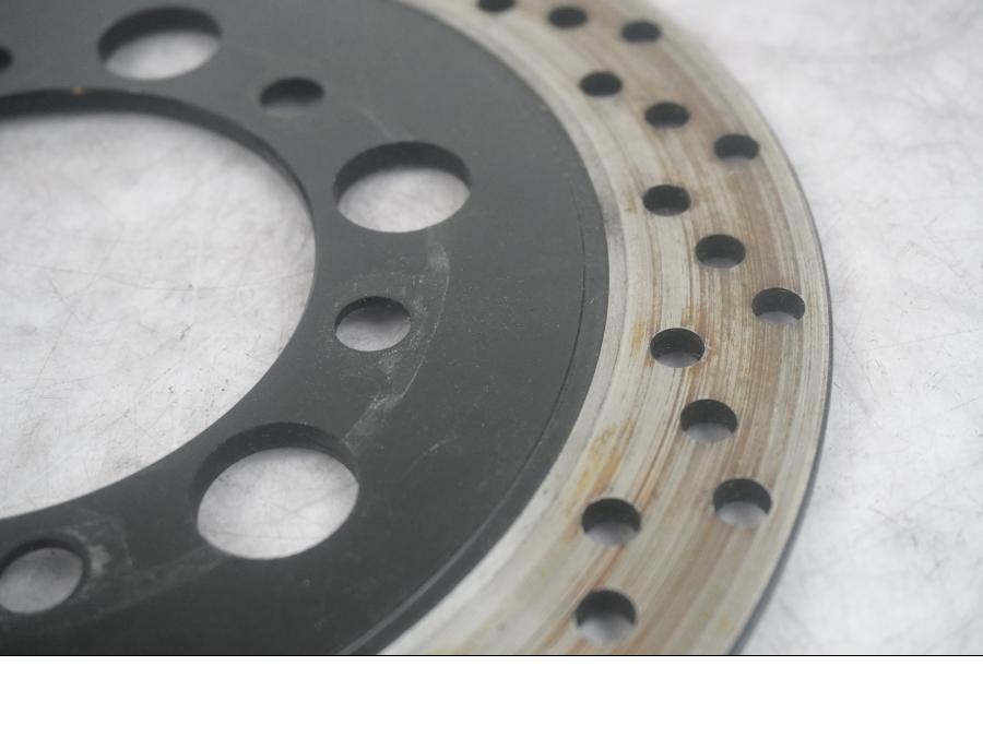 Vänster sida på Bromsskiva från en Hyosung GT 650 -2006 motorcykel.