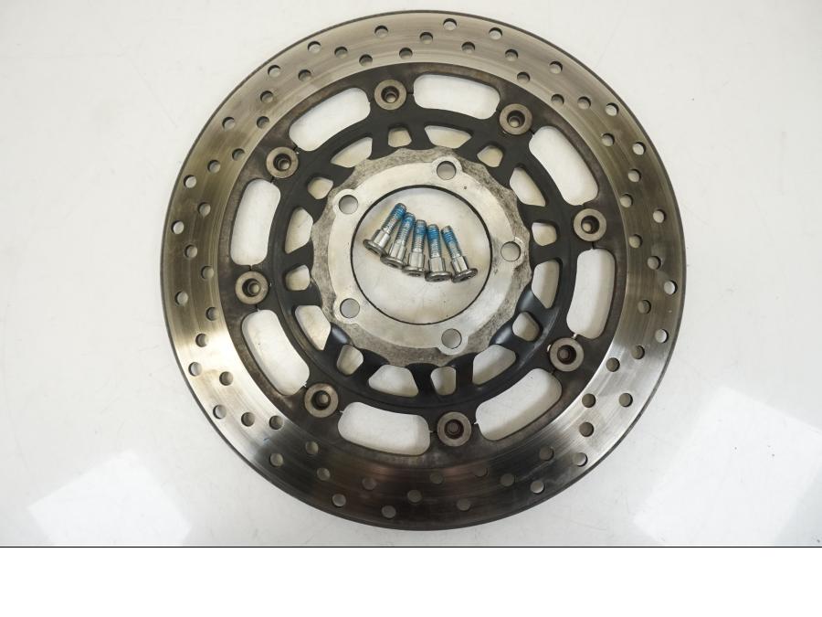 Framsidan på Bromsskiva från en Triumph TT 600 -2002 motorcykel.