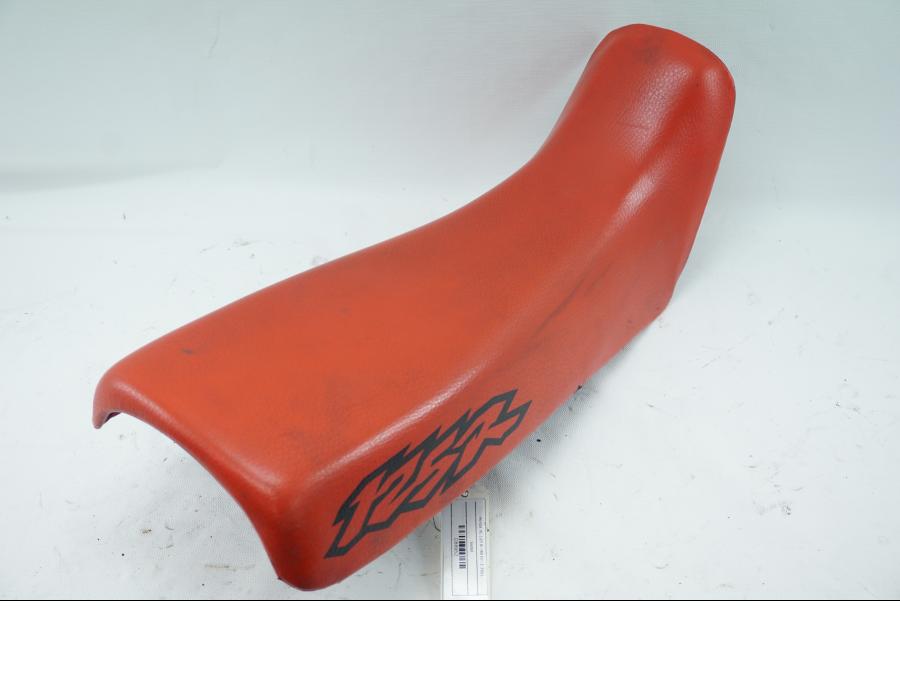 Vänster sida på Sadel från en Honda XL 125 R -1998 motorcykel.