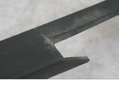 Höger sida på Kedjeskydd från en Triumph Tiger -2009 motorcykel.