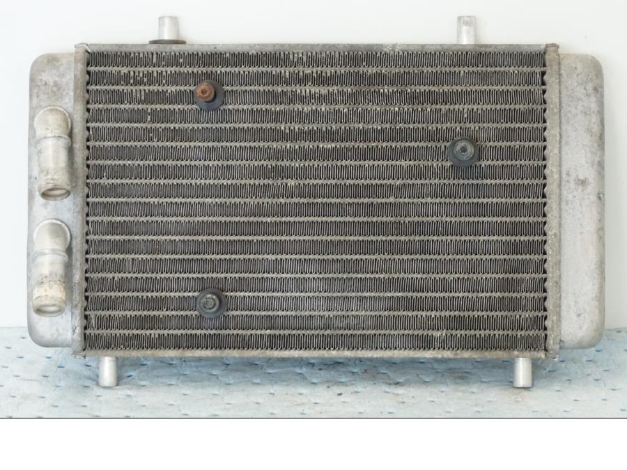 Baksidan på Vattenkyl från en Yamaha X-Max 250 -2016 scooter.