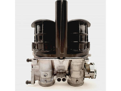 Baksidan på Spjällhus från en Honda CB 500 F -2013 motorcykel.