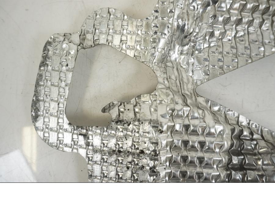 Vänster sida på Värmeskydd från en Suzuki GSX-R 1000 -2007 motorcykel.