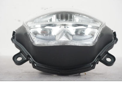 Vänster sida på Strålkastare från en Honda ANC 125 -2022 scooter.