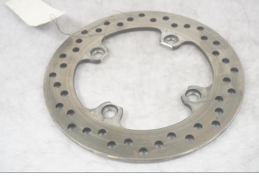 Höger sida på Bromsskiva från en Triumph Street Triple -2011 motorcykel.
