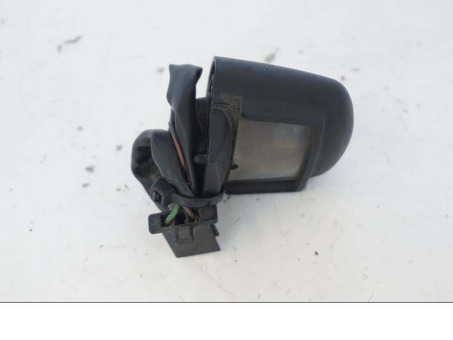 Framsidan på Skyltbelysning från en Honda SH 300 A -2011 scooter.