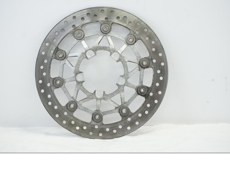 Baksidan på Bromsskiva från en Triumph Daytona 675 -2010 motorcykel.