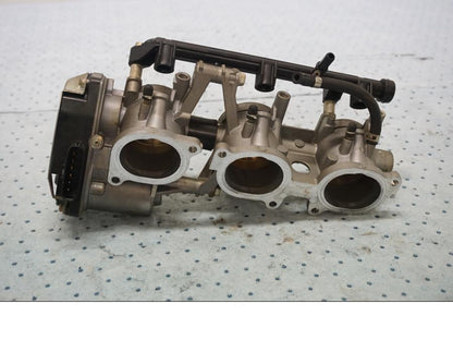 Baksidan på Spjällhus från en MV Agusta F3 675 -2014 motorcykel.