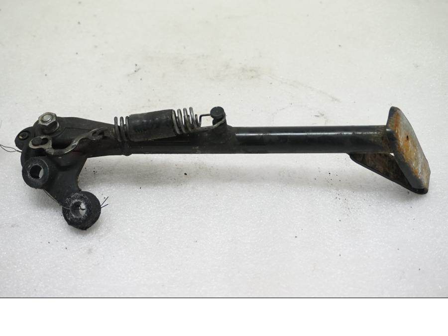 Baksidan på Sidostöd från en Ducati Monster 1200 -2015 motorcykel.