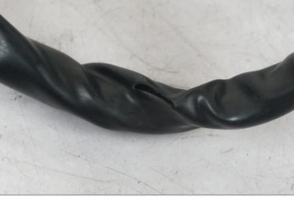 Snett nerifrån på Styrelreglage från en Suzuki SV 650 -1999 motorcykel.