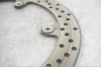 Vänster sida på Bromsskiva från en BMW R 1200 RT -2013 motorcykel.