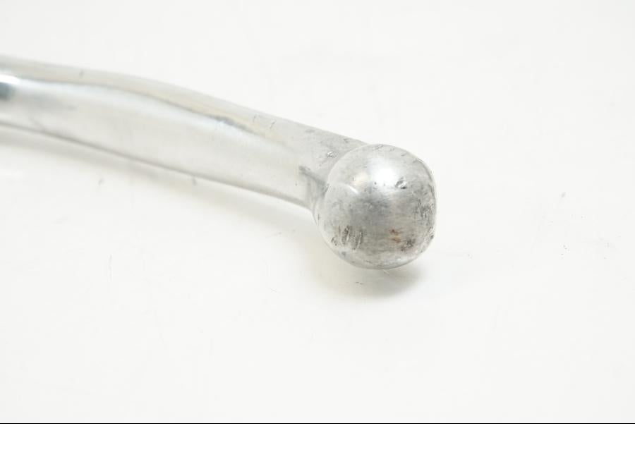 Baksidan på Kopplingsgrepp från en Honda VFR 800 -2003 motorcykel.