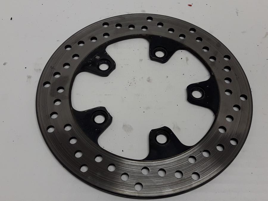 Framsidan på Bromsskiva från en Suzuki SV 1000 -2004 motorcykel.