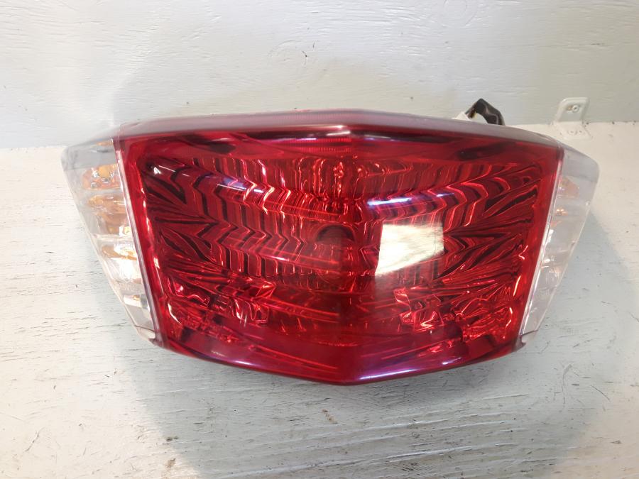 Framsidan på Baklampa från en Yamaha Cygnus -2007 motorcykel.