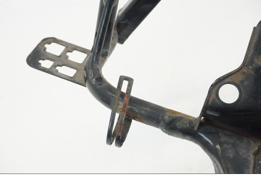 Vänster sida på Toppkåpstag från en Honda NSR 125 -1991 motorcykel.