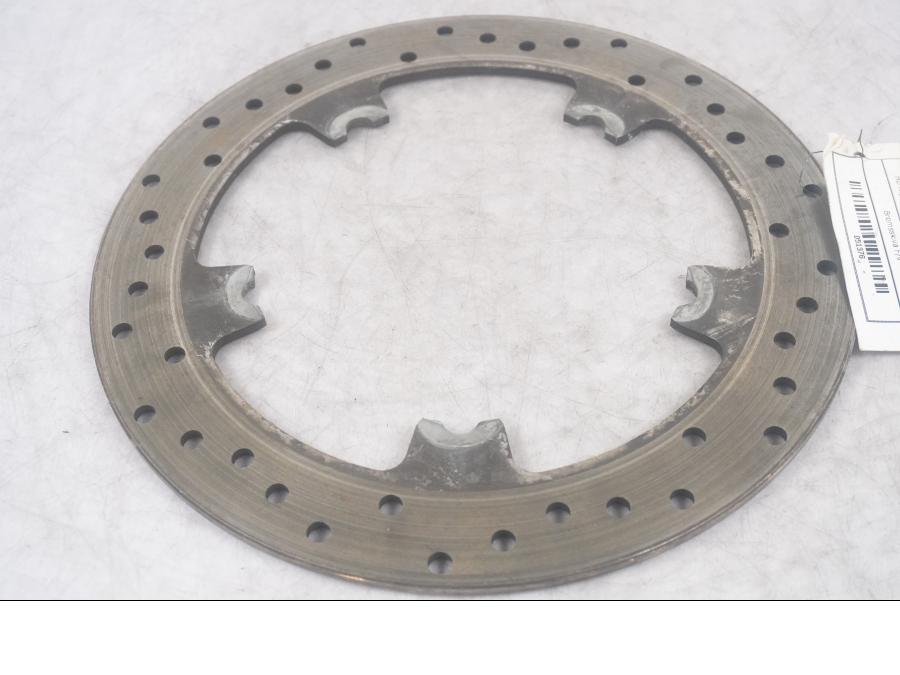 Framsidan på Bromsskiva från en H-D V-Rod 1130 -2006 motorcykel.