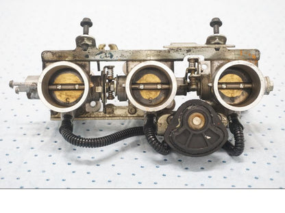 Framsidan på Spjällhus från en Triumph Tiger -2001 motorcykel.