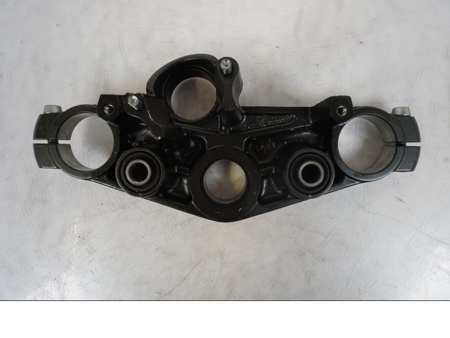 Vänster sida på Gaffelkrona från en Kawasaki ER-6F -2010 motorcykel.