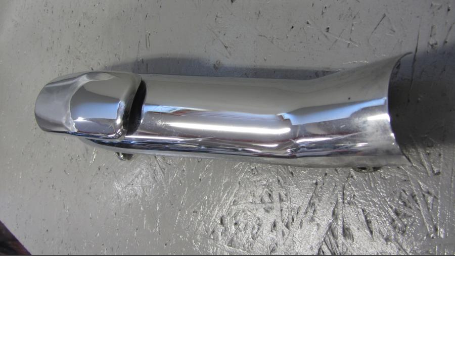 Höger sida på Värmeskydd från en Triumph Thunderbird 1600 -2011 motorcykel.