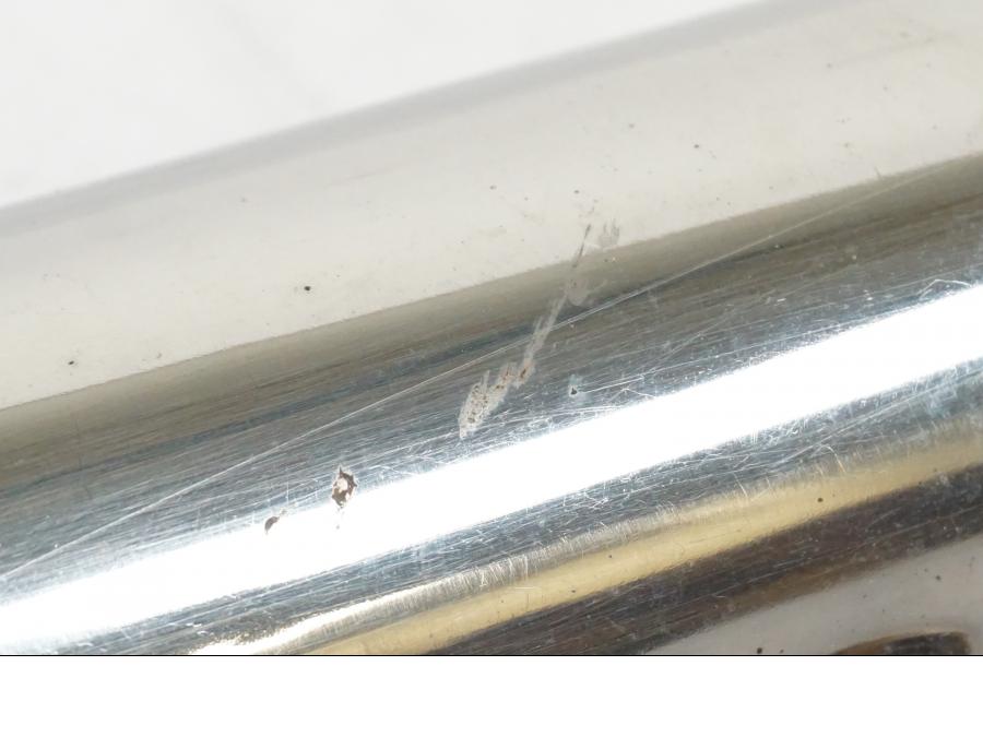 Vänster sida på Värmeskydd från en Suzuki SV 650 S -2005 motorcykel.