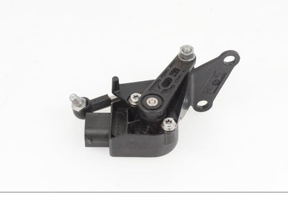 Baksidan på Strålkastarjusteringsreglage från en BMW S 1000 XR -2019 motorcykel.