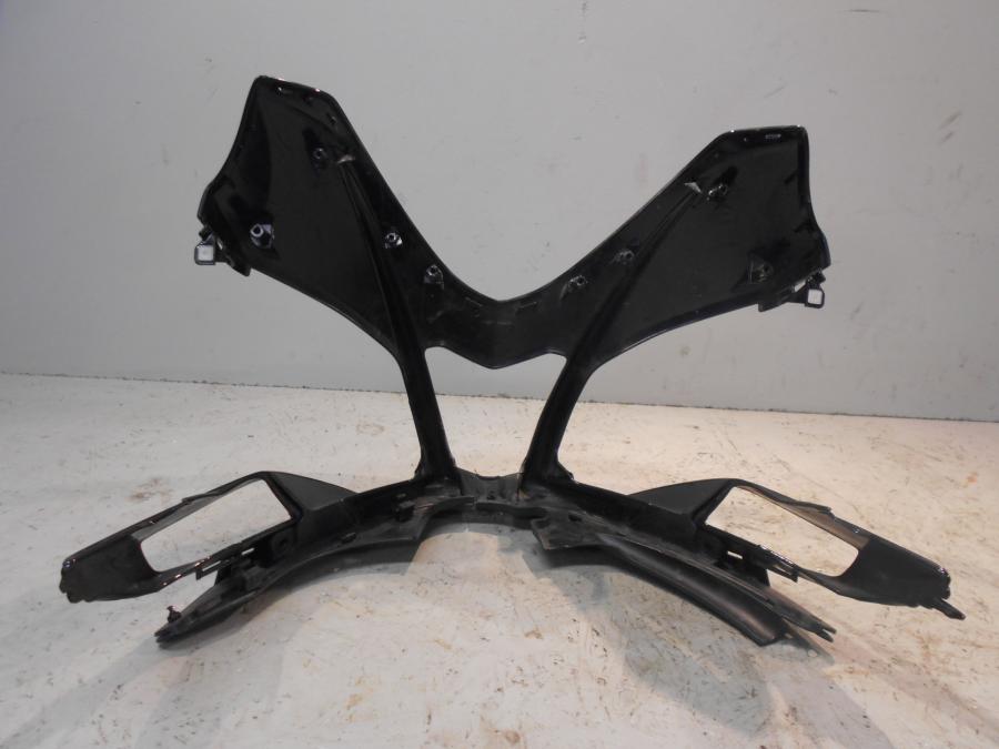 Vänster sida på Toppkåpa från en Aprilia Tuono V4R -2016 motorcykel.