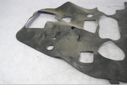 Vänster sida på Värmeskydd från en Kawasaki ZX-10R -2008 motorcykel.