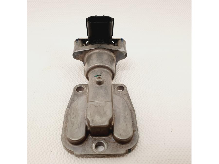 Vänster sida på Tomgångsventil från en Honda CB 500 F -2013 motorcykel.