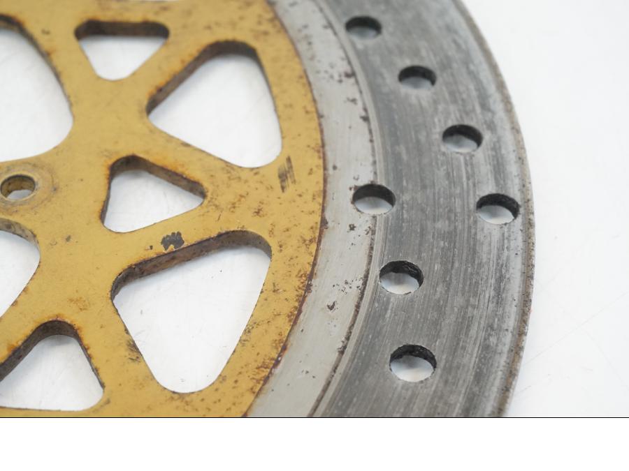 Vänster sida på Bromsskiva från en Honda NSR 125 -1991 motorcykel.