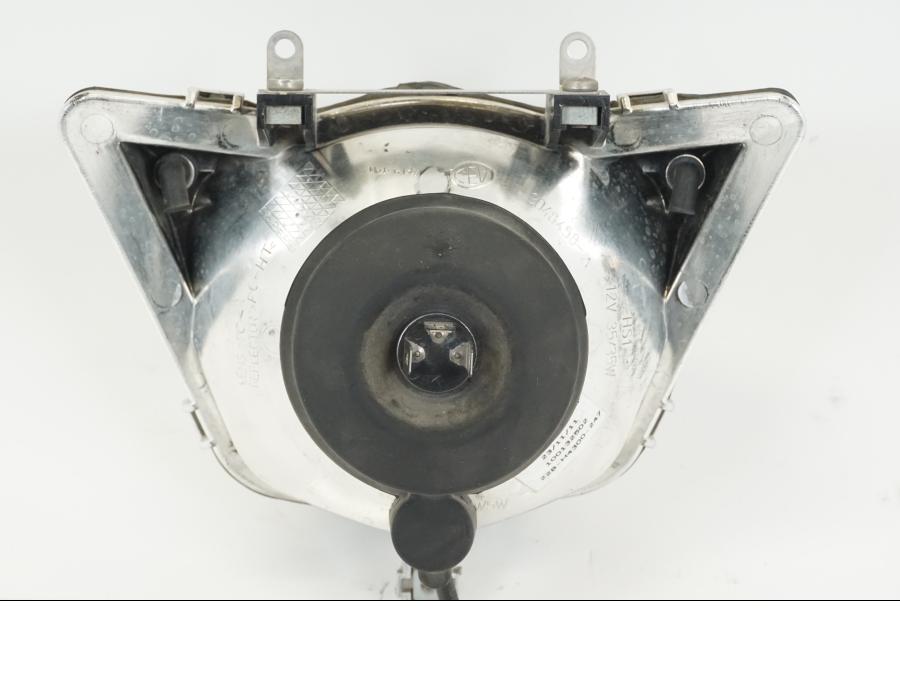 Baksidan på Strålkastare från en Yamaha WR 125 -2011 motorcykel.