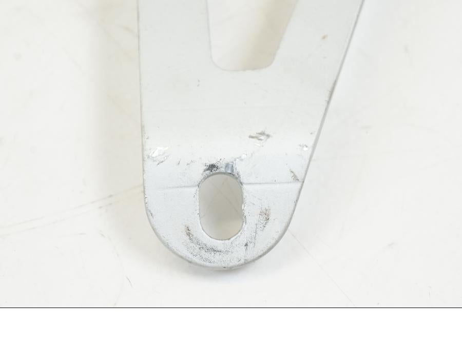 Höger sida på Ljuddämparfäste från en Aprilia Tuono V4R -2011 motorcykel.