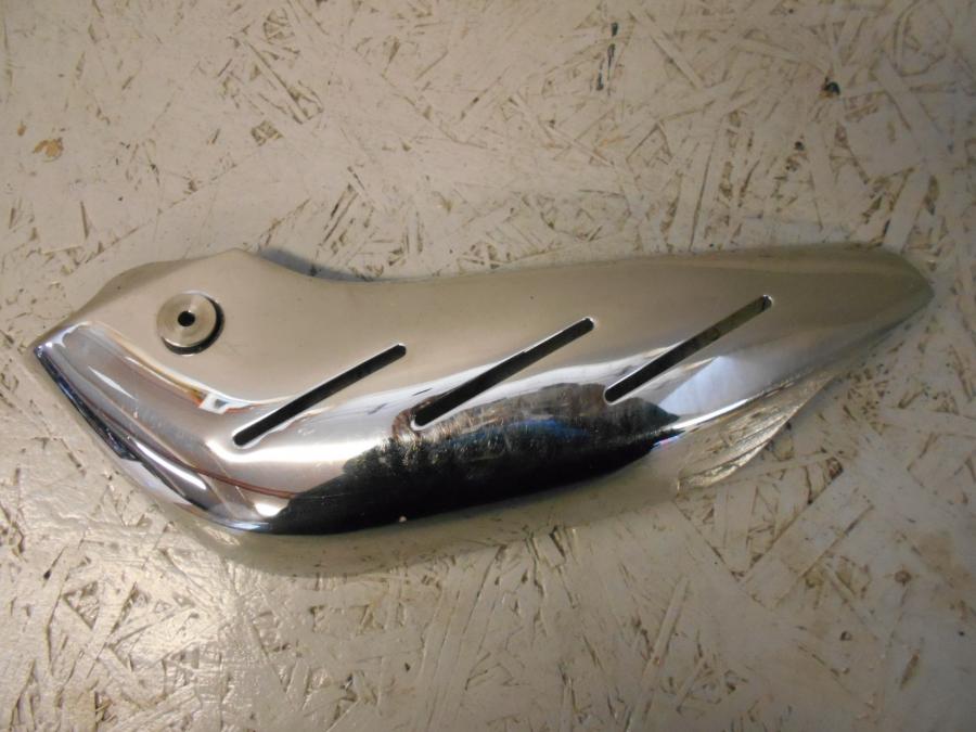 Framsidan på Värmeskydd från en Triumph Speed Triple -2011 motorcykel.