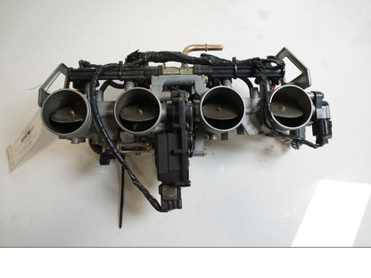 Baksidan på Spjällhus från en Kawasaki Z 1000 -2003 motorcykel.