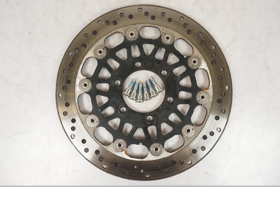 Framsidan på Bromsskiva från en Triumph Daytona 955I -2000 motorcykel.