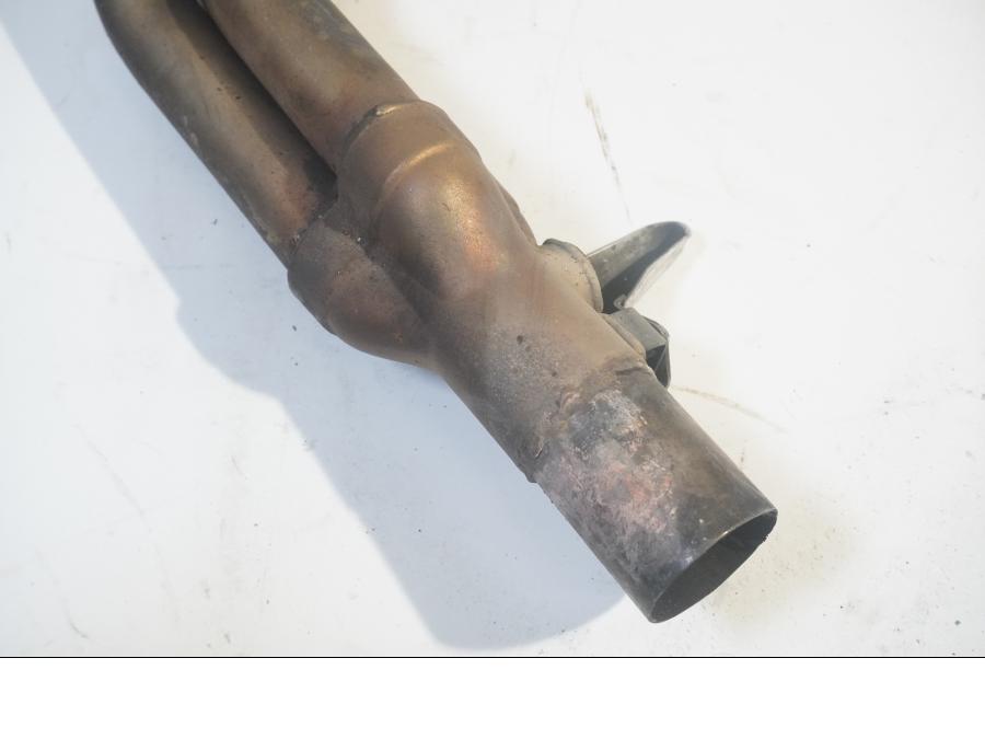 Höger sida på Grenrör från en Triumph Street Triple R -2009 motorcykel.