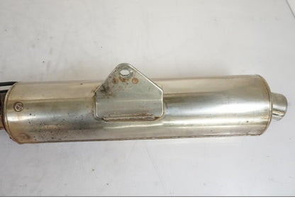 Vänster sida på Avgassystem från en Honda CBR 125 R -2006 motorcykel.