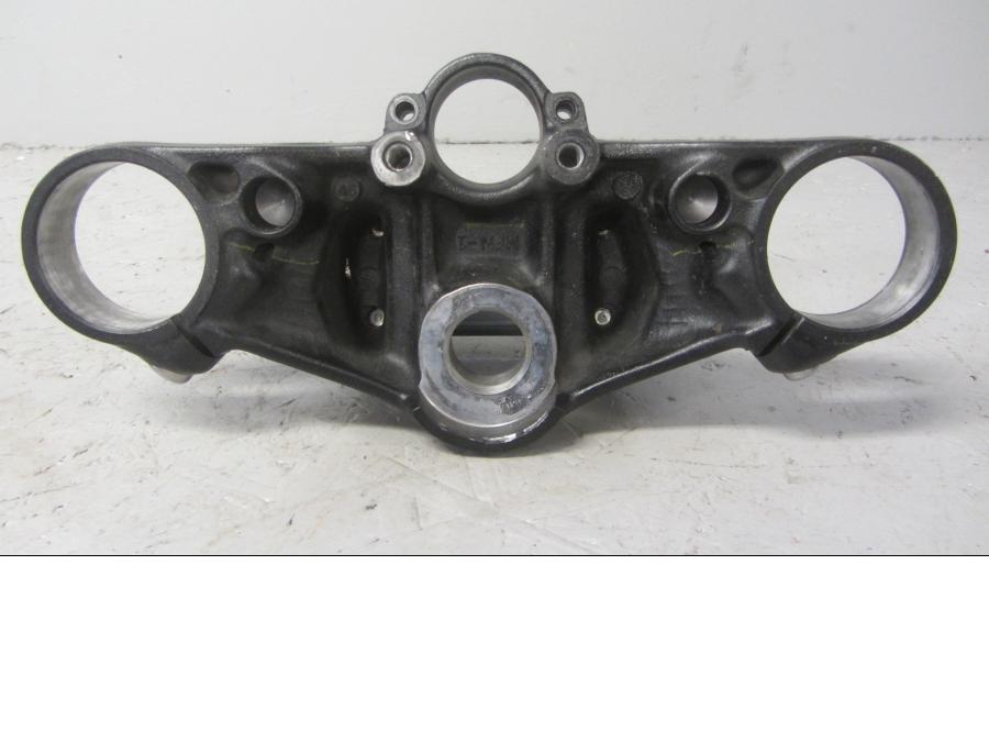 Vänster sida på <p>Gaffelkrona övre från Honda CB 1000 R 2010.</p>

<p>Mindre skavmärken finns, se bilder.</p> motorcykel.