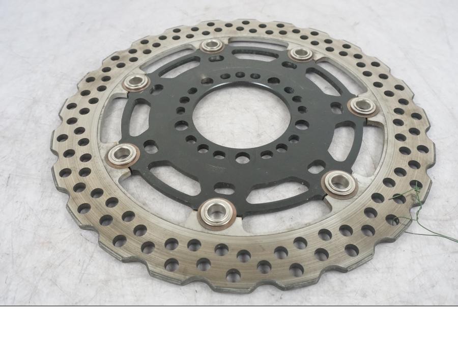 Höger sida på Bromsskiva från en Kawasaki Versys 1000 -2012 motorcykel.