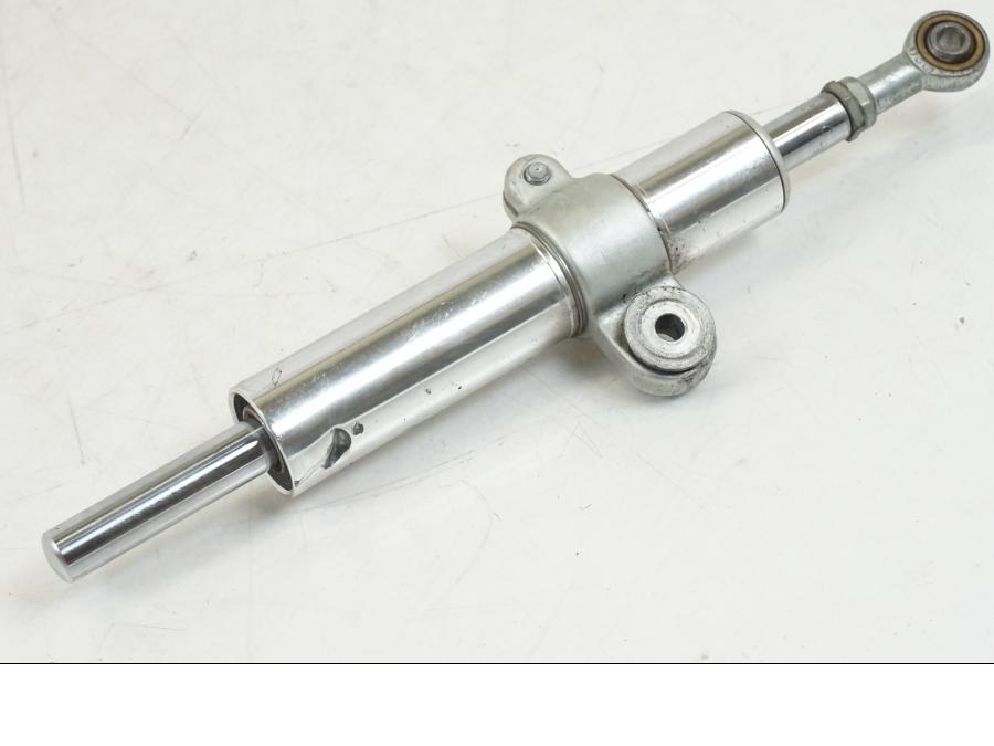 Snett nerifrån på Styrdämpare från en Aprilia Tuono V4R -2011 motorcykel.