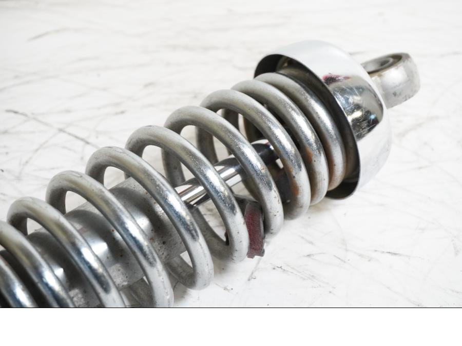 Snett uppifrån på Stötdämpare från en Yamaha XV 1100 -1994 motorcykel.