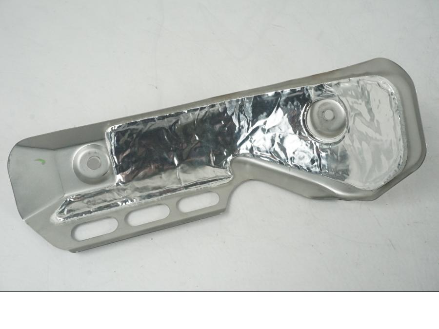 Vänster sida på Värmeskydd från en Yamaha Tracer 700 GT -2024 motorcykel.